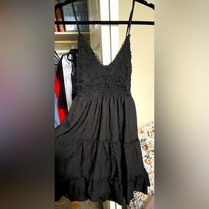 Adorable black mini dress perfect for a beach